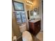 Cozy bathroom features a marble countertop and decorative towels on the towel bar at 12619 50Th E Ct, Parrish, FL 34219