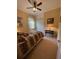Comfortable bedroom featuring natural lighting and a ceiling fan at 12619 50Th E Ct, Parrish, FL 34219