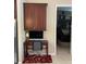 Small office nook featuring a desk and cabinet above the computer at 12619 50Th E Ct, Parrish, FL 34219