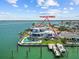 Stunning waterfront home features a pool, dock, and 73 solar panels for energy efficiency at 12650 7Th E St, Treasure Island, FL 33706