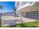 Home's front exterior shows a long drive and a rounded building design at 12650 7Th E St, Treasure Island, FL 33706