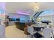 Open kitchen featuring a large island, modern lighting, and easy access to the dining and living areas at 12650 7Th E St, Treasure Island, FL 33706