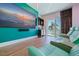 Private media room with reclining chairs, large screen TV and wet bar for entertaining at 12650 7Th E St, Treasure Island, FL 33706