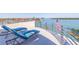 Rooftop deck with comfortable seating and stunning water views at 12650 7Th E St, Treasure Island, FL 33706