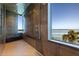 Spacious shower with dual shower heads and a beautiful view of the water at 12650 7Th E St, Treasure Island, FL 33706