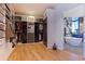 Spacious walk-in closet with custom shelving and access to bathroom at 12650 7Th E St, Treasure Island, FL 33706