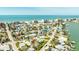 Aerial view of beach homes near the ocean with scenic waterfront views and beautiful neighborhood at 13313 3Rd E St, Madeira Beach, FL 33708