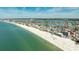 Aerial view of property near the beach offering clear, turquoise waters and waterfront community at 13313 3Rd E St, Madeira Beach, FL 33708