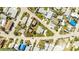 Aerial view showcasing the property lines on a lot with surrounding neighborhood at 13313 3Rd E St, Madeira Beach, FL 33708
