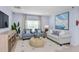 Comfortable living room with plush seating, natural light, and stylish decor creating a welcoming atmosphere at 13478 Tropical Breeze Way, Hudson, FL 34669