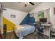 Bedroom with modern decor featuring cool paint design, workstation, and window view at 15856 49Th N St, Clearwater, FL 33762