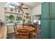 Cozy kitchen area with access to the lanai through sliding glass doors at 15856 49Th N St, Clearwater, FL 33762
