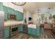 Well-lit kitchen featuring stainless steel appliances, updated finishes, and an open concept layout at 15856 49Th N St, Clearwater, FL 33762