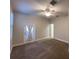 Spacious bedroom with ample natural light, ceiling fan, and walk-in closet at 16127 Churchview S Dr, Lithia, FL 33547