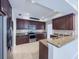 Well-equipped kitchen featuring stainless steel appliances and granite countertops at 16127 Churchview S Dr, Lithia, FL 33547