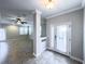 Bright and airy living space with tiled floors, ceiling fan, and natural light at 16127 Churchview S Dr, Lithia, FL 33547