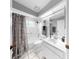 Clean bathroom with a shower, vanity, and toilet at 1613 E Del Webb Blvd, Sun City Center, FL 33573