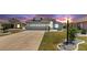 Charming single-Gathering home with well-manicured lawn and beautiful landscaping at 1613 E Del Webb Blvd, Sun City Center, FL 33573