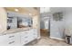 Kitchen view featuring custom drawers with granite countertops, tile flooring, and an open layout to other rooms at 1613 E Del Webb Blvd, Sun City Center, FL 33573