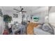 Spacious living and dining area featuring hardwood floors, contemporary decor, and a ceiling fan at 1613 E Del Webb Blvd, Sun City Center, FL 33573