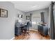 Well-lit office space with hardwood floors and a large window at 1613 E Del Webb Blvd, Sun City Center, FL 33573