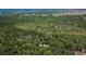 Expansive acreage featuring wooded landscape, hidden homes, and a peaceful, secluded atmosphere at 16420 Iola Woods Trl, Dade City, FL 33523