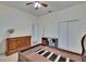 Bedroom with carpet, closet and desk at 16420 Iola Woods Trl, Dade City, FL 33523