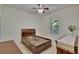 Bedroom with carpet, bedframe, and light at 16420 Iola Woods Trl, Dade City, FL 33523