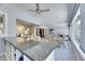 Entertainer's bar with granite counters, lots of seating and views of the sunroom at 1806 Chickasaw Trl, Valrico, FL 33596
