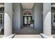 Elegant entryway with double doors and classic architectural details at 1806 Chickasaw Trl, Valrico, FL 33596