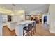 Open concept kitchen offering a breakfast bar and direct view into the expansive living room at 1806 Chickasaw Trl, Valrico, FL 33596