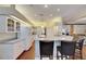 Well-equipped kitchen with center island and breakfast bar with easy access to living area at 1806 Chickasaw Trl, Valrico, FL 33596