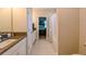 Bathroom showcasing granite countertops, tile flooring, a shower, and modern fixtures at 21794 Pristine Lake Blvd, Land O Lakes, FL 34637