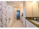Bright bathroom with granite countertops, tiled floor and shower featuring modern fixtures at 21794 Pristine Lake Blvd, Land O Lakes, FL 34637