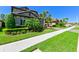 Beautiful home with lush landscaping, trees and healthy green lawn at 21794 Pristine Lake Blvd, Land O Lakes, FL 34637