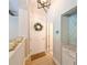 The entry hallway features a white door with wreath, and a built-in counter at 21794 Pristine Lake Blvd, Land O Lakes, FL 34637