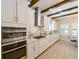 Well-appointed kitchen with a gas range, stainless-steel appliances, and custom backsplash at 21794 Pristine Lake Blvd, Land O Lakes, FL 34637