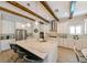 Modern kitchen showcasing a spacious island, pendant lighting, and stainless-steel appliances at 21794 Pristine Lake Blvd, Land O Lakes, FL 34637