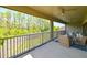 Large screened lanai offering scenic green views and comfy outdoor seating arrangements at 21794 Pristine Lake Blvd, Land O Lakes, FL 34637