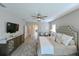 A serene main bedroom showcases elegant decor, plush bedding, and soothing colors at 21794 Pristine Lake Blvd, Land O Lakes, FL 34637