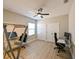 Bright office with two workstations, laminate floors, and white trim at 21794 Pristine Lake Blvd, Land O Lakes, FL 34637