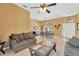 Open-concept space flows from the living room to the dining area, perfect for gatherings at 27054 Fordham Dr, Wesley Chapel, FL 33543