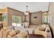 Comfortable living room with access to the backyard and plenty of natural light at 27054 Fordham Dr, Wesley Chapel, FL 33543