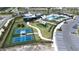 Community amenities with a pool, clubhouse, playground, and pickleball courts offer residents an active lifestyle at 31966 Asbury Ave, Wesley Chapel, FL 33545