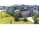 Charming two-story home featuring a two-car garage, manicured landscaping, and a welcoming entrance at 31966 Asbury Ave, Wesley Chapel, FL 33545