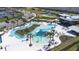 Aerial view of the community's lazy river, a perfect spot for summer fun and relaxation at 31966 Asbury Ave, Wesley Chapel, FL 33545