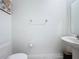 Powder room with white fixtures and modern decor at 32046 Powderpuff Mimosa Dr, San Antonio, FL 33576