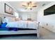 A soothing Primary bedroom boasts plush carpeting and gentle sunlight, enhancing the serene ambiance at 32046 Powderpuff Mimosa Dr, San Antonio, FL 33576