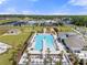 Inviting community pool complex featuring spacious sun decks and recreational facilities for resident enjoyment at 36519 Garden Wall Way, Zephyrhills, FL 33541