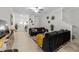 Open-concept living room with tile flooring and modern décor at 36519 Garden Wall Way, Zephyrhills, FL 33541